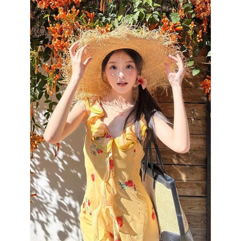 Yellow lotus leaf beautiful floral suspender dress women's summer vacation French summer temperament beach fishtail dress