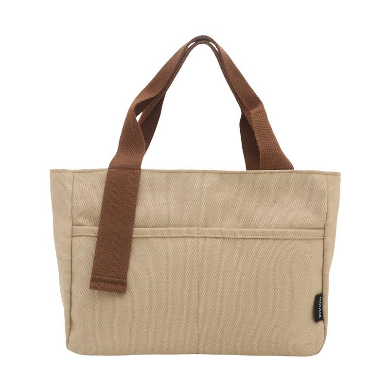 

Korean version of solid color simple canvas bag, hand bag, college student class shoulder bag, daily commuting shopping handbag хакі