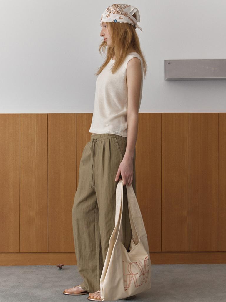 Elssibeui Diagonal Buttons Sleeveless Knit_Ivory
