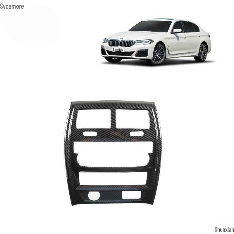 Carbon Fiber Interior Trim Set for BMW 5 Series: Center Console, Gear Shift, Multimedia Lift Panel, and Air Vents.