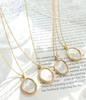 Elegant Gold-Plated Titanium Steel Necklace with Oval White Sea Shell Pendant