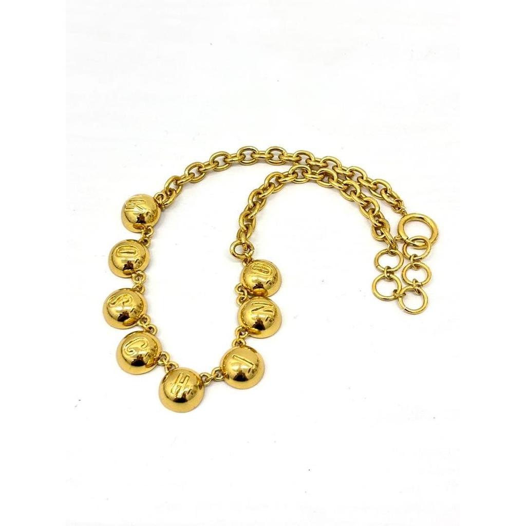 Used Moschino gold color necklace with logo charm vintage