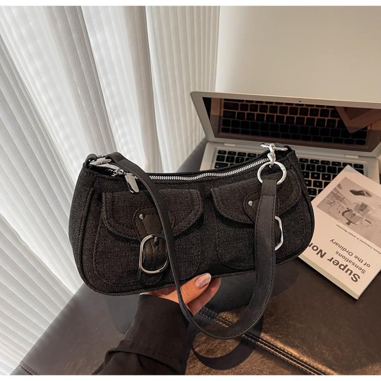 Retro foreign shoulder women's bag 2025 new popular niche design hand carry fashion baguette bag Korean version armpit bag