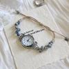Xiaoxiangfeng Gewebte Perlenuhr Armbanduhr für Mädchen Nische Leichter Luxus Vielseitig Kamelienuhr