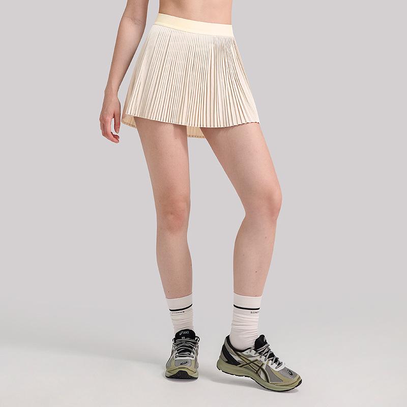 "Breezy, hip-covering athletic skirt: slimming, pleated design for outdoor fitness, tennis, and yoga."