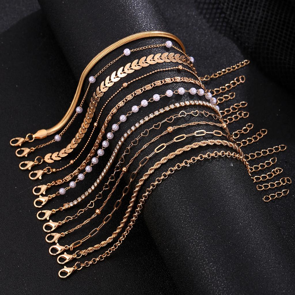 Hot-selling creative pieces inlaid with rhinestones, twists, imitation pearls and other multi-shape bracelet sets, women's stacked jewelry