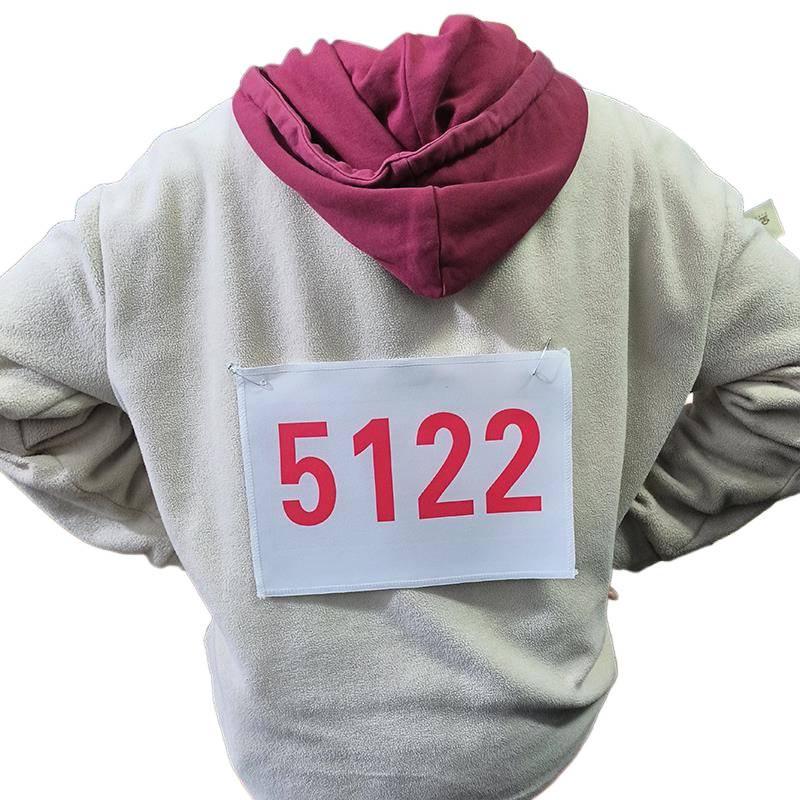 Red Running Marathon Race Bib with Black Number Plate