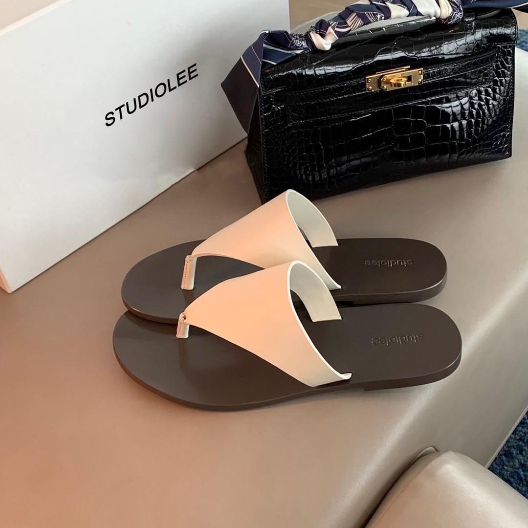 

2025 spring and summer round head simple triangular toe flat bottom slippers women s seaside vacation leather comfortable women s slippers 40 белый