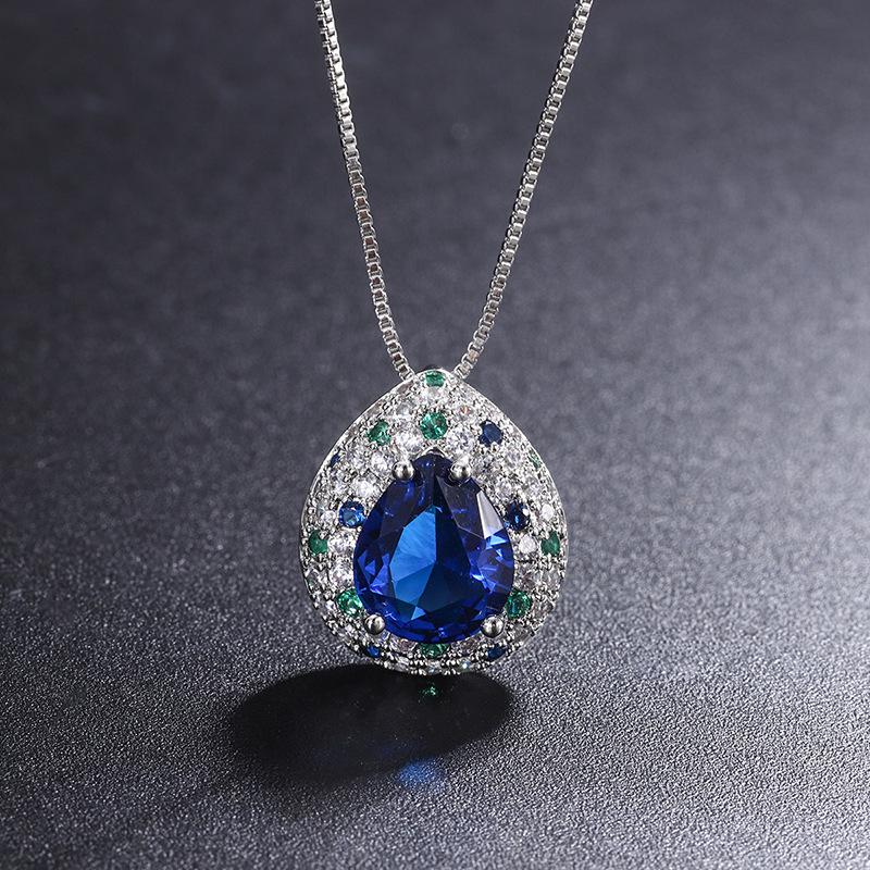 

Ювелирный набор: кольцо, серьги-пусеты, подвеска, имитация синего стекла, форма капли воды, сочетание цветов, 10 * 12