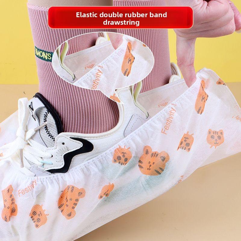 50 Pezzi/set Copriscarpe usa e getta Per la casa interni Antiscivolo Tessuto non tessuto Stampa cartoon Spesso Uso ripetuto Resistente all'usura Copripiede per adulti