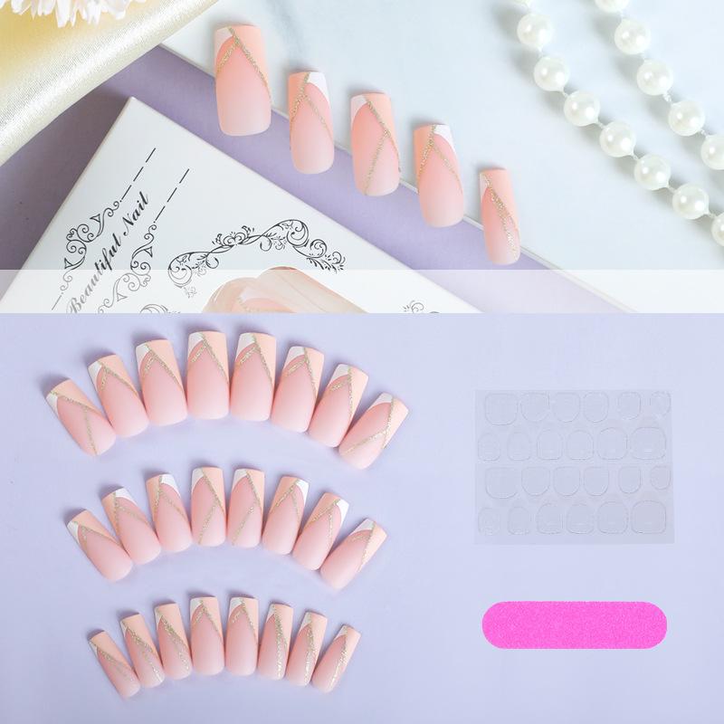 

Накладные ногти ручной работы с французским кончиком и полосками золотого глиттера