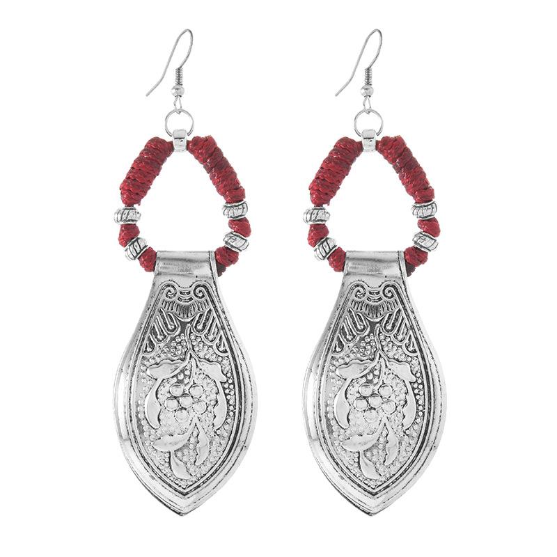 Woven earrings exaggerated Miao silver engraved earrings exotic retro style horse dress long earrings