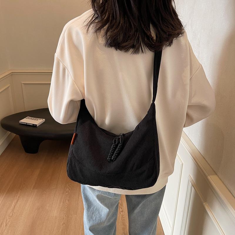 Retro student class versatility new dumpling bag women's solid color light casual commuting personality pleated crossbody bag