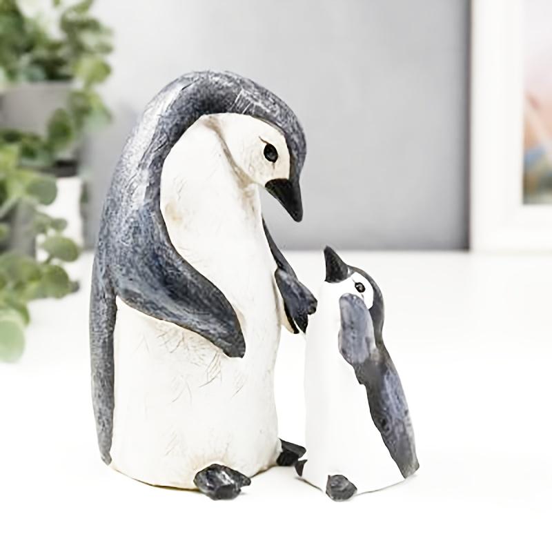 A Set of Two Resin Statues Featuring a Mother And Penguin Showcasing a Creative Family Theme These Can Serve As Decorative Pieces for Home