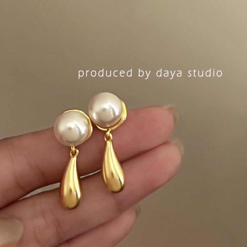 

Винтажные металлические серьги-капли, роскошные ощущения и простая элегантность