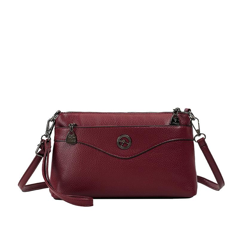 Elegant Crossbody Bag with Textured Finish and Dual Zip Pockets