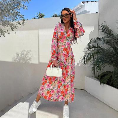 A New Spring Women's Dress with A V-neck Print, Long Sleeves and A Cinched Waist