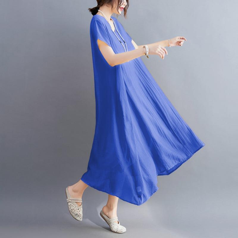 A Woman In A Solid V-neck Dress for Summer