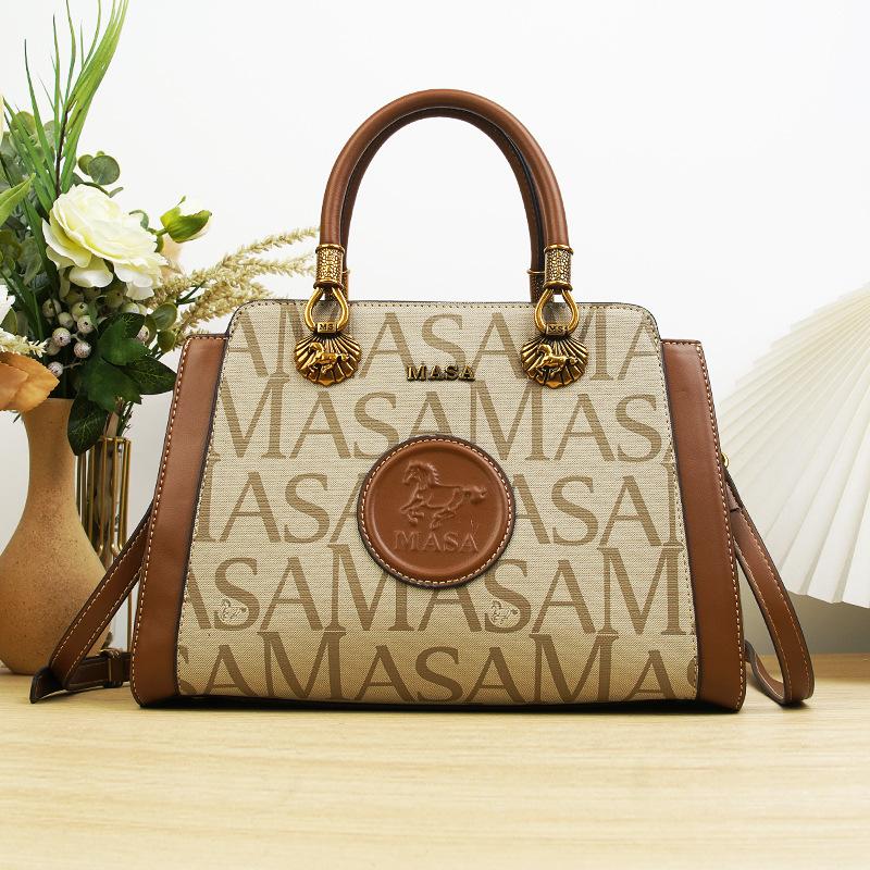

Large capacity casual women s shoulder messenger bag portable cylinder bag retro trend printed bag women One size fits all