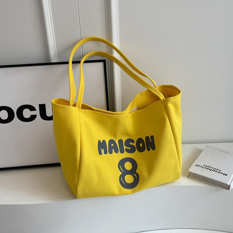 

Spacious 2024 New Trendy Tote Bag Elegant Commuter Handheld Canvas Bag For Everyday Essentials Yellow