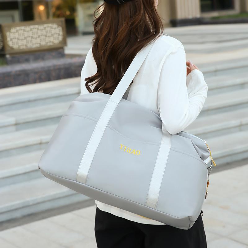 Short outing luggage bag simple leisure hand-held travel bag fashion sports training can set tie rod fitness bag