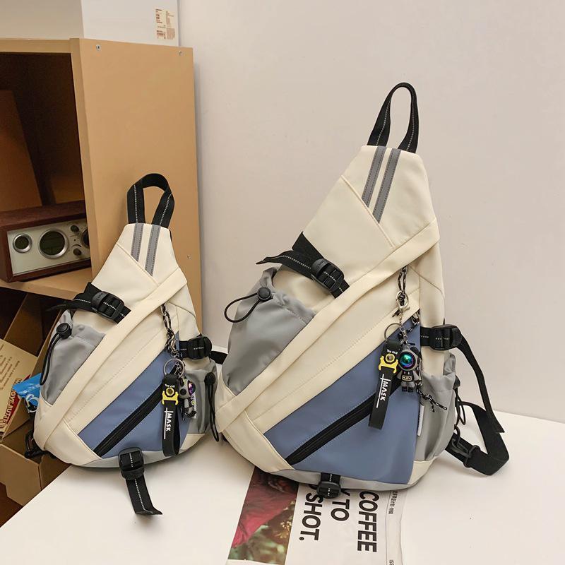 

Stylish Large Capacity Color Block Backpack - Lightweight, Multifunctional & Casual Single Shoulder or Crossbody Schoolbag. Single Bag