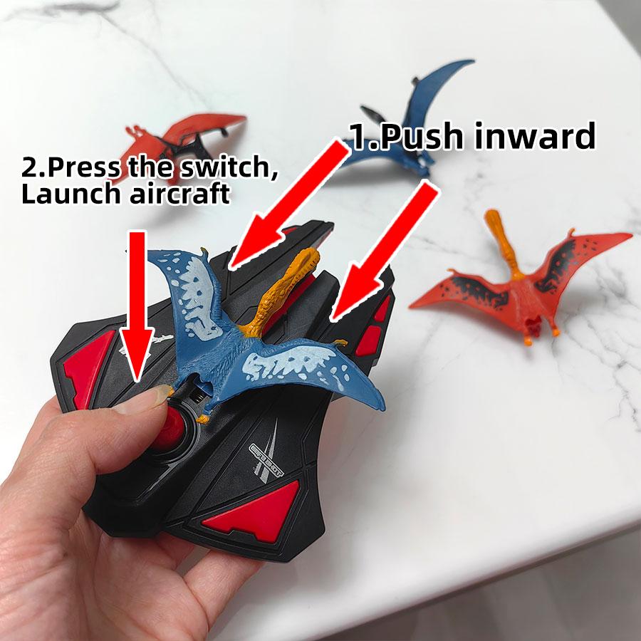 Svart flygande leksak 1 st utskjutare + 4 st dinosaurie enkel utskjutare Leksak lämplig för utomhusunderhållning Manuell utskjutning