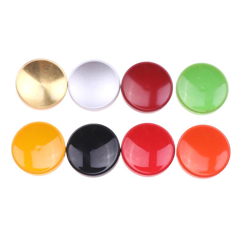 

Увігнута поверхня металевого затвора камери Латунна кнопка спуску Аксесуари для камер вина червоного кольору