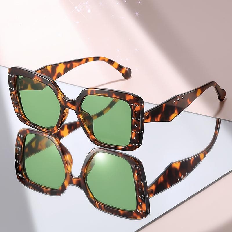 Modern Chic Oversized Square Sunglasses with Black Frame, Studded Accents, and Dark Lenses for Bold Trendy Retro Fashion Women