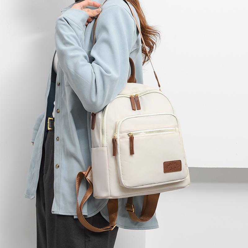 Weiblicher Reiserucksack mit großer Kapazität, einfarbig, Schultasche