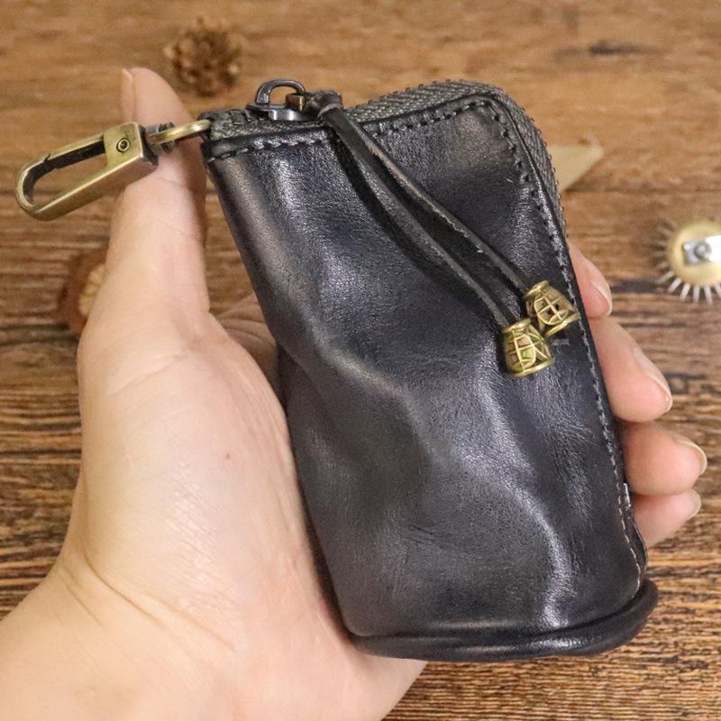 Men's Retro Genuine Leather Waist Key Holder: Large Capacity Cowhide Bucket Bag with Multifunctional Zipper Pouch.
