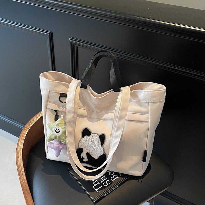 Casual large-capacity shoulder bag women's new fashion handheld cloth bag versatile class tote bag