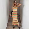 A Figure-hugging Knitted Long Dress for Women in Summer, Featuring A Revealing Back Design with Striped Patterns and A Fitted Bandeau Style.