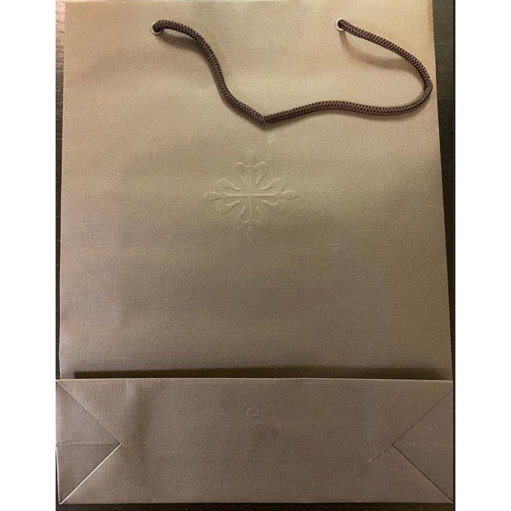 Used Unopened Patek Philippe Collection Book 2024-2025 with paper bag, wristwatch