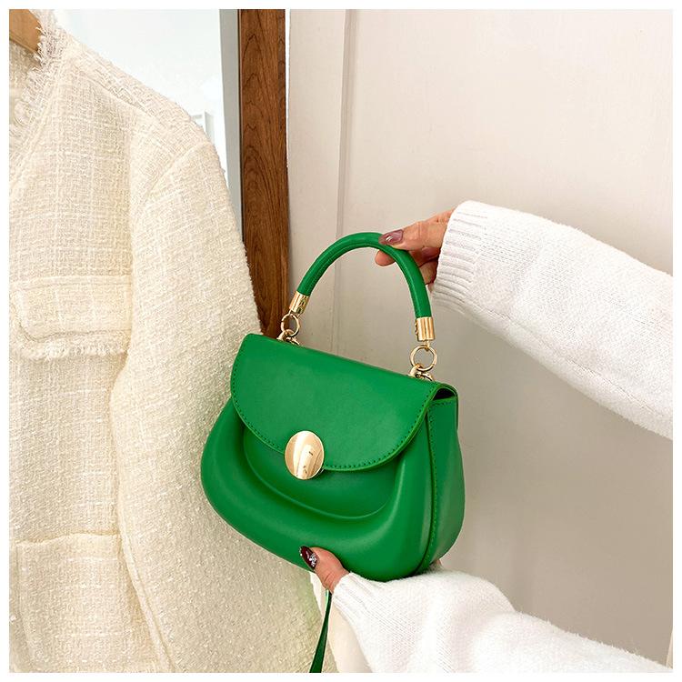

Trend candy color mini bag women s 2024 new fashion niche handbag Internet celebrity shoulder women s bag small round bag зелений