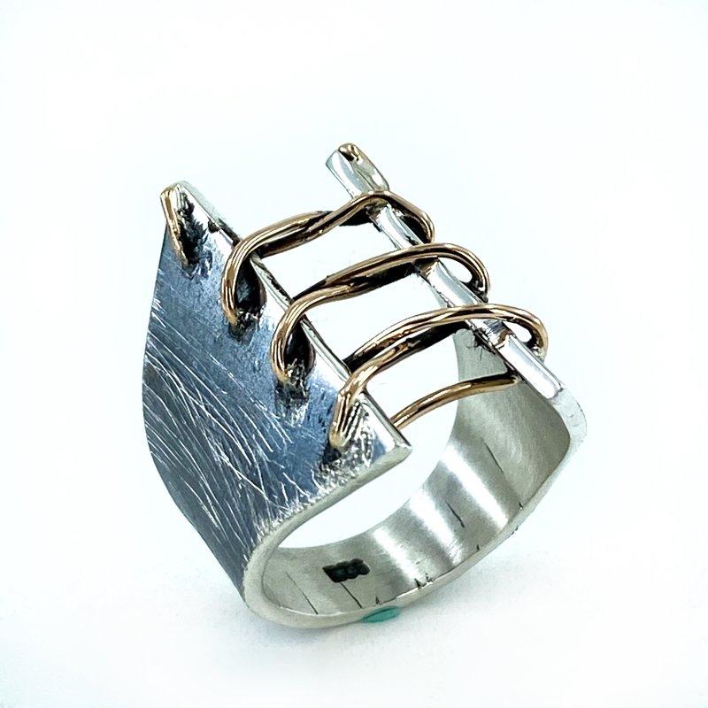 

Сшитое вручную кольцо специального дизайна с краями из подлинного серебра 925 пробы