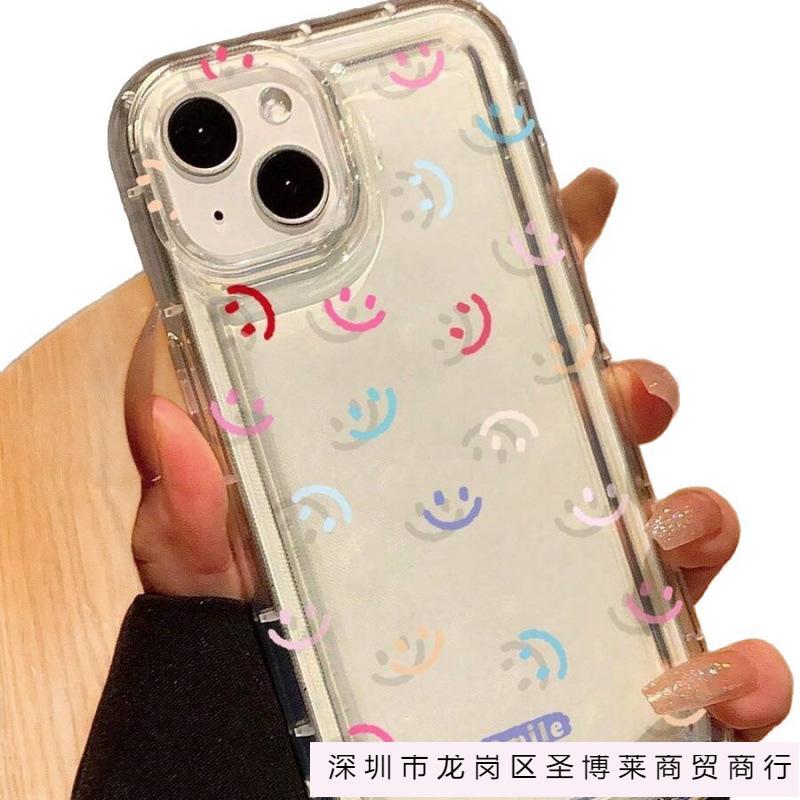 Colorful smiley face is suitable for Apple 16promax mobile phone case 15plus14 transparent 13 airbag 12 European and American explosion