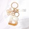 Chic White Tassel Letter Keychain with Resin Epoxy Pendant - Stylish Ornament for Bags