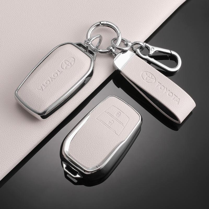 Läder Bilnyckel Fodral Fobskydd för Toyota RAV4 Crown Hilux Fortuner Yaris Prius Corolla Camry Land Cruiser Avensis Verso Prado C