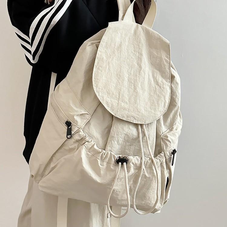 Schoolbag New Korean Niche Lightweight Nylon Backpack Girls Casual Fashion Drawstring Travel Large Capacity Backpack