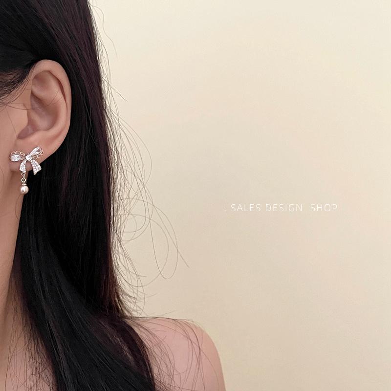 Korean Zircon Bow Pearl Stud Earrings - High-End, Versatile & Elegant.