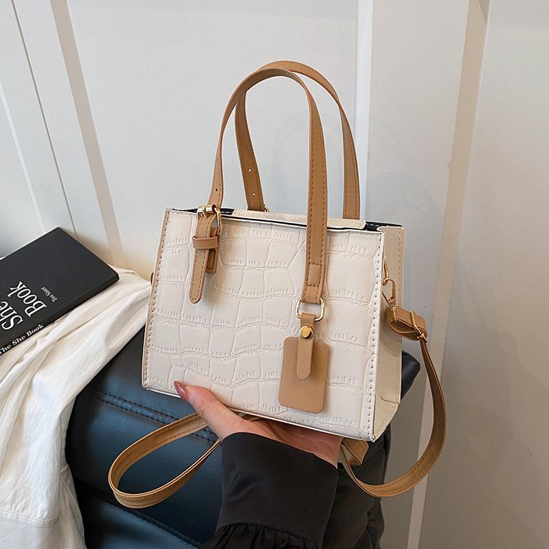 

Кожаная нишевая темпераментная сумка женская 2025 новая легкая роскошная сумка-мессенджер высококлассная портативная сумка-тоут белый