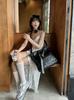 French lace v-neck suspender dress women's summer vacation irregular skirt white beautiful waist mid-length dress