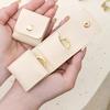 Compact Travel Jewelry Organizer Bag with Secure Button Closure Separate Compartments for Rings Earrings Necklaces