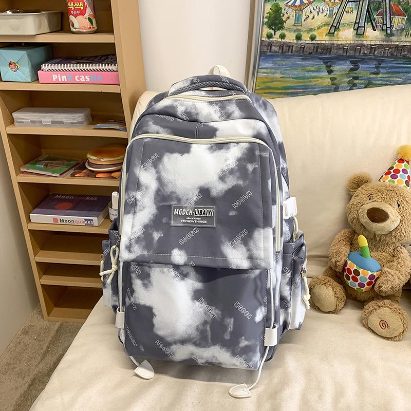 

Korean Casual Tie Dyed and Printed Backpacks for Junior and Senior High School Students Large Capacity Backpacks for College Students .