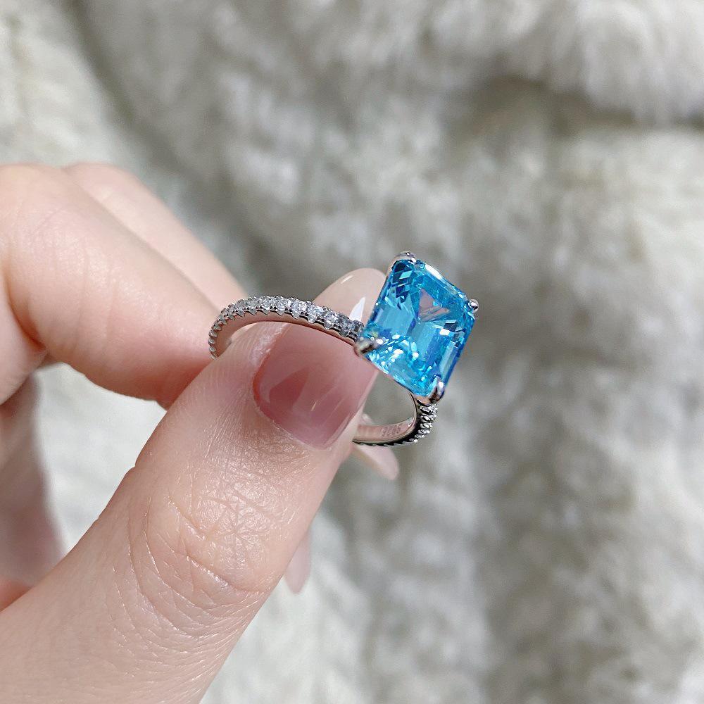 Aquamarine Emerald-Cut Ring In 925 Sterling Silver with Pave Diamonds, Plated In PT950 Gold.