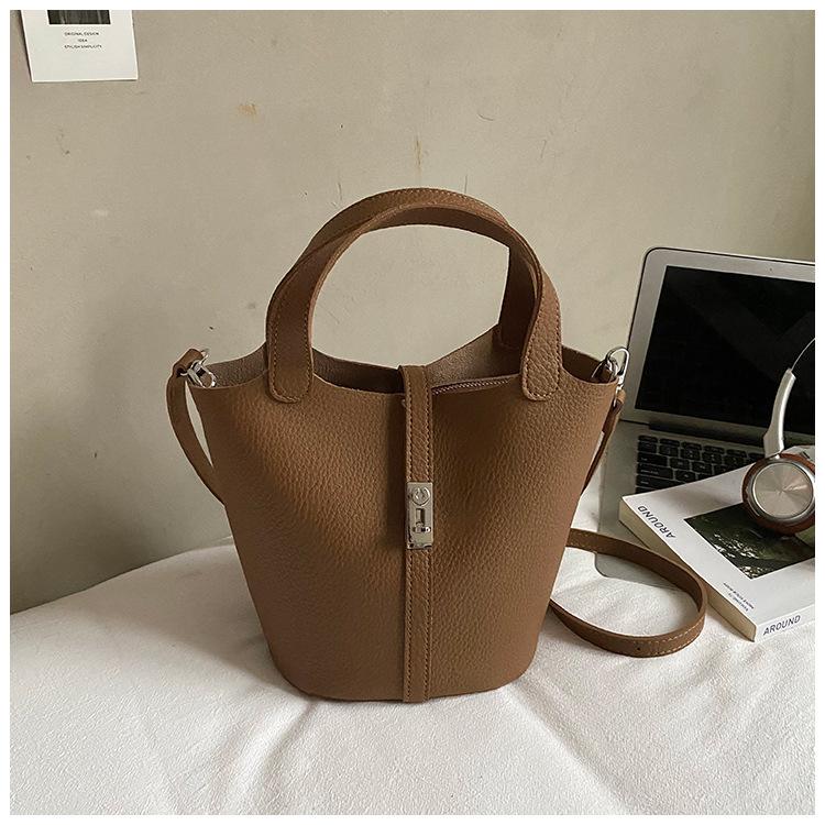 Fashion vegetable basket bucket bag women's 2025 autumn new high-value shoulder bag simple solid color niche messenger bag