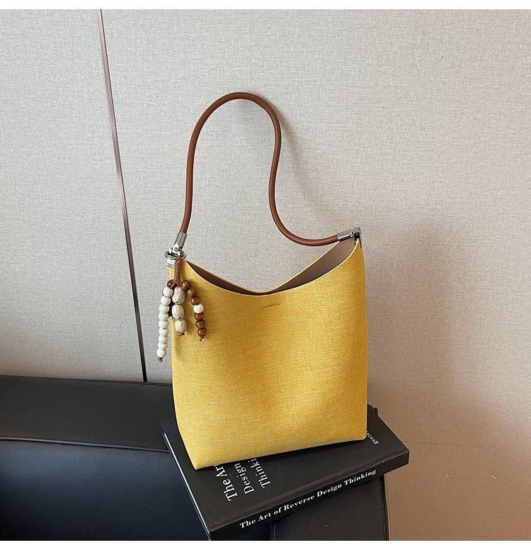 

2025 нишевая универсальная ретро сумка-ведро текстура повседневный тренд лоскутная сумка модная плечевая сумка мессенджер жёлтый