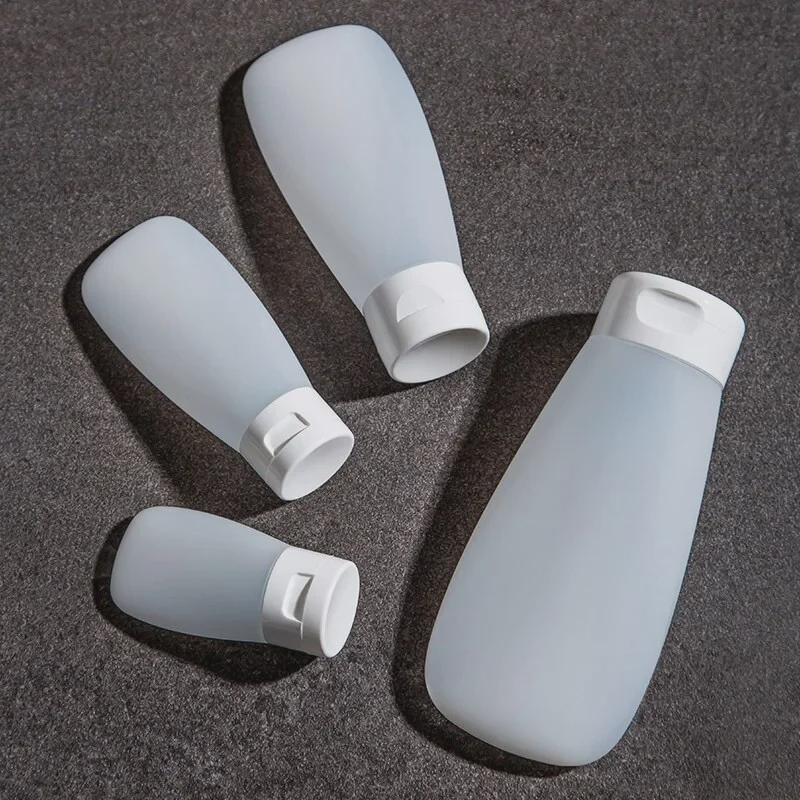 Quetschflaschen-Set in Reisegröße für Shampoo und Duschgel