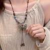 New Chinese ethnic style butterfly necklace niche ancient style high-end long woven sweater chain Maillard collarbone chain